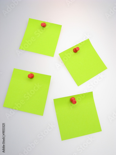 four sheet of green paper and red writing button