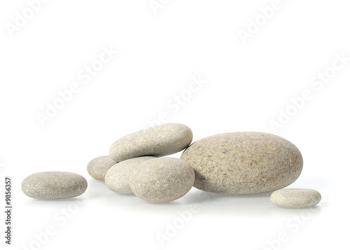 Fotografia Pile of pebbles isolated on a white background