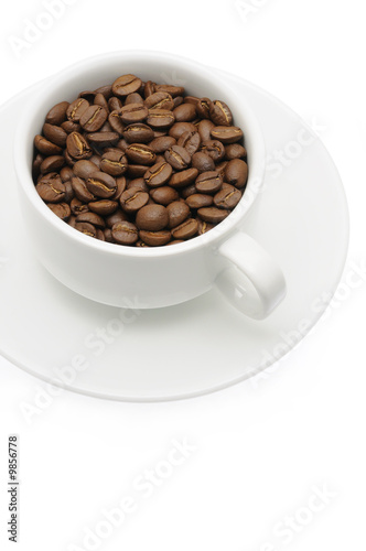 Cup of coffee beans in isolated white background