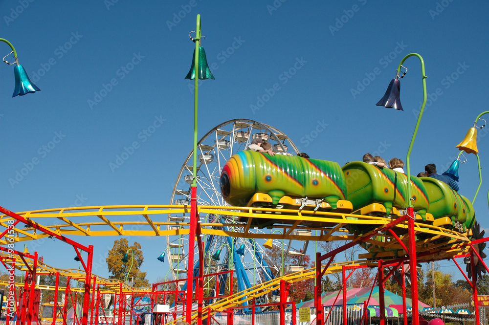 Brightly colored kiddie rides at a county fair