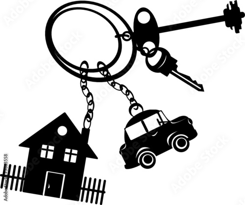 Keys from the car and houses on a white background