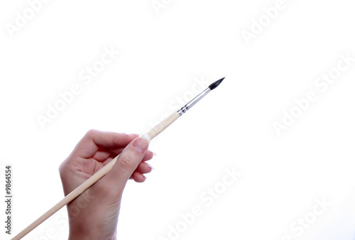 paint brush in the hand
