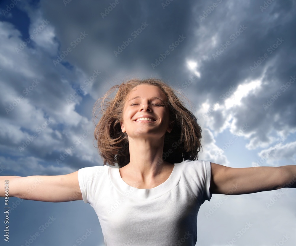 portrait of a happy woman with sky background portrait of a happy woman with sky background