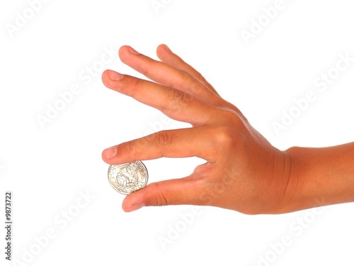 Hand, holding one dollar coin
