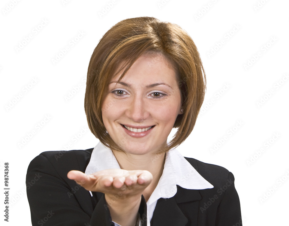 Smiling brunette offering something on her hand. Smiling brunette offering something on her hand.