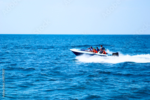 Speed boat at full speed on the high seas. © Supertrooper