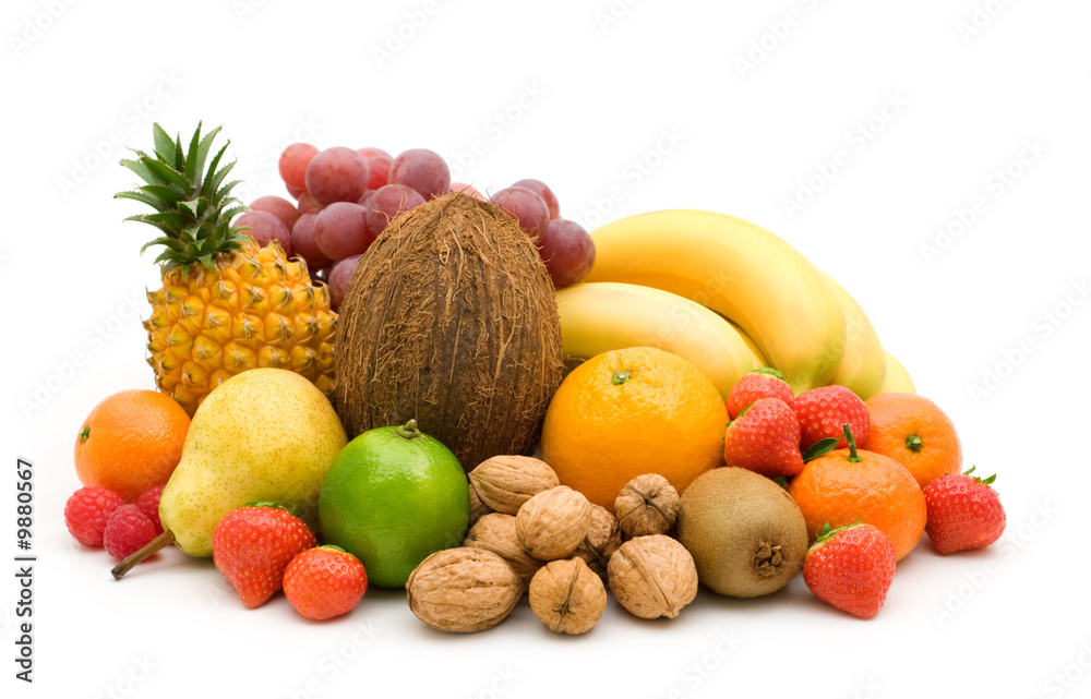 fresh fruits and nuts on white background