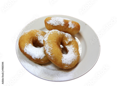 donuts on a plate isolated on a white background