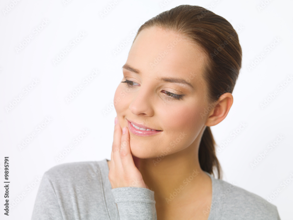 Portrait of beautiful young woman on white background Portrait of beautiful young woman on white background