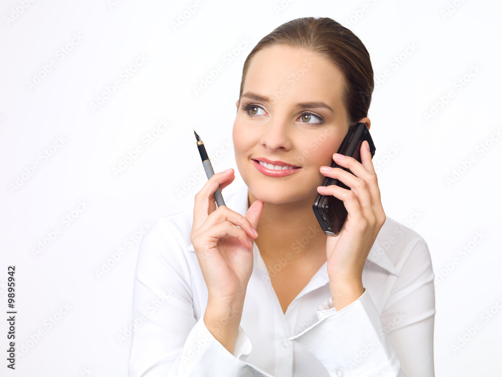 Portrait of beautiful and young business woman using cell phone Portrait of beautiful and young business woman using cell phone