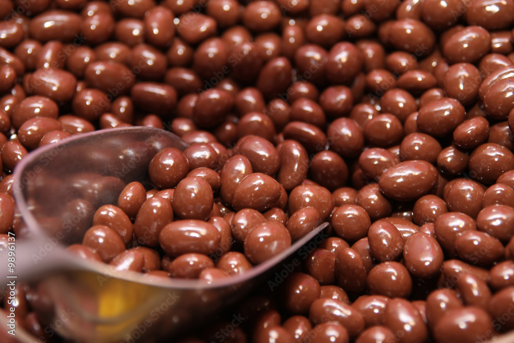 details of many chocolate candy in close up details of many chocolate candy in close up