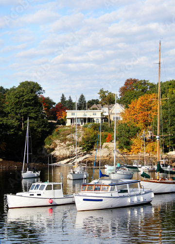 Fishing boats docked in Perkins Cove, Maine in Autumn.