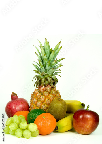 Mixed healthy fruits on a white background.