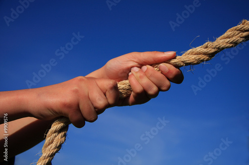 Hands Pulling On Rope