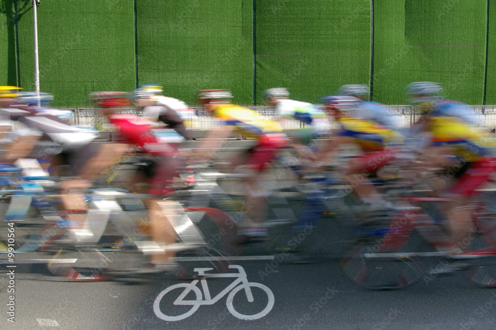 Fototapeta premium Cyclist passing with cycle-path in foreground
