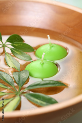 bowl of water with candles - beauty treatment