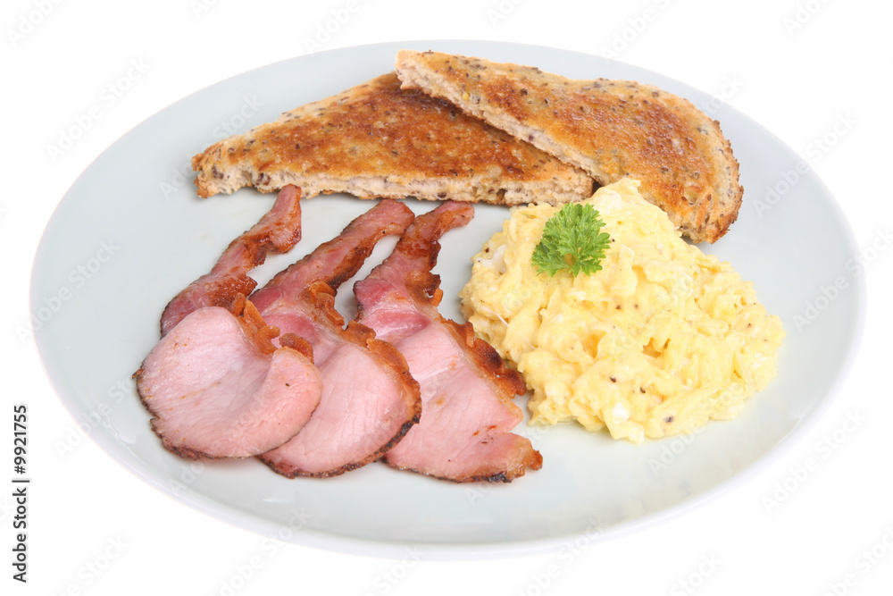 Scrambled egg with grilled back bacon and toast Scrambled egg with grilled back bacon and toast
