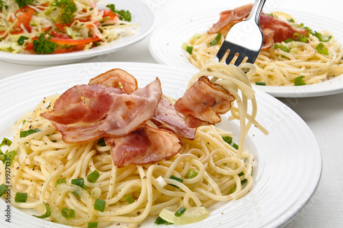 Pasta with fried bacon and vegetables