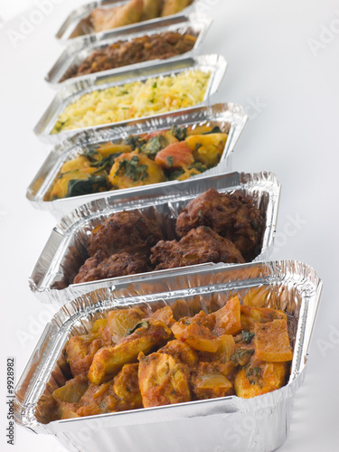 Selection Of Indian Take Away Dishes In Foil Containers photo