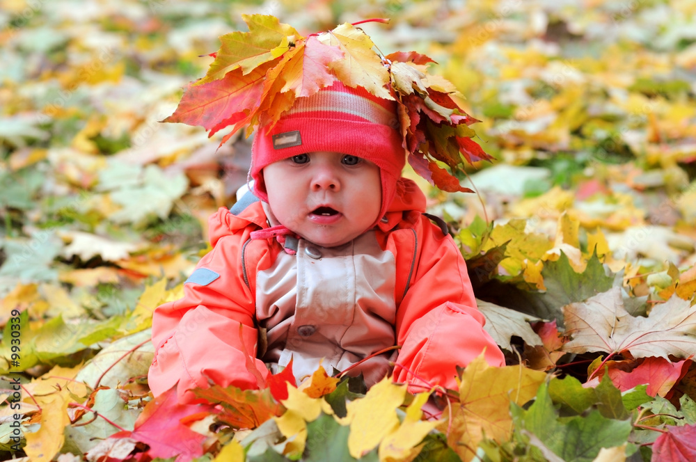 7-months Baby-girl with garland of leafs on head 7-months Baby-girl with garland of leafs on head