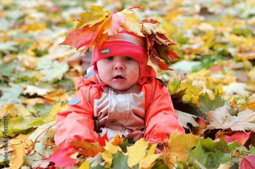 7-months Baby-girl with garland of leafs on head