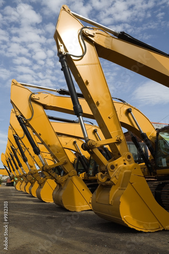 row of excavators