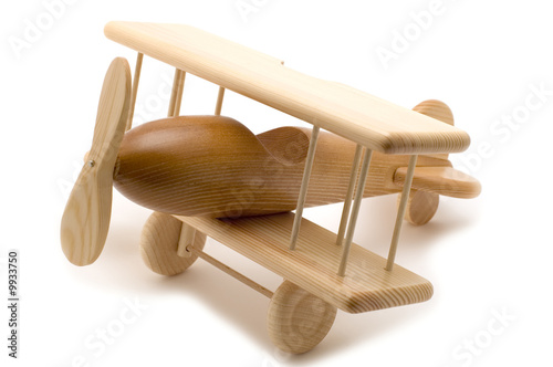 object on white - wooden toy airplane