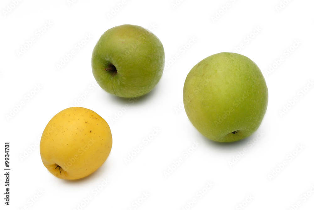 two green apples and yellow one