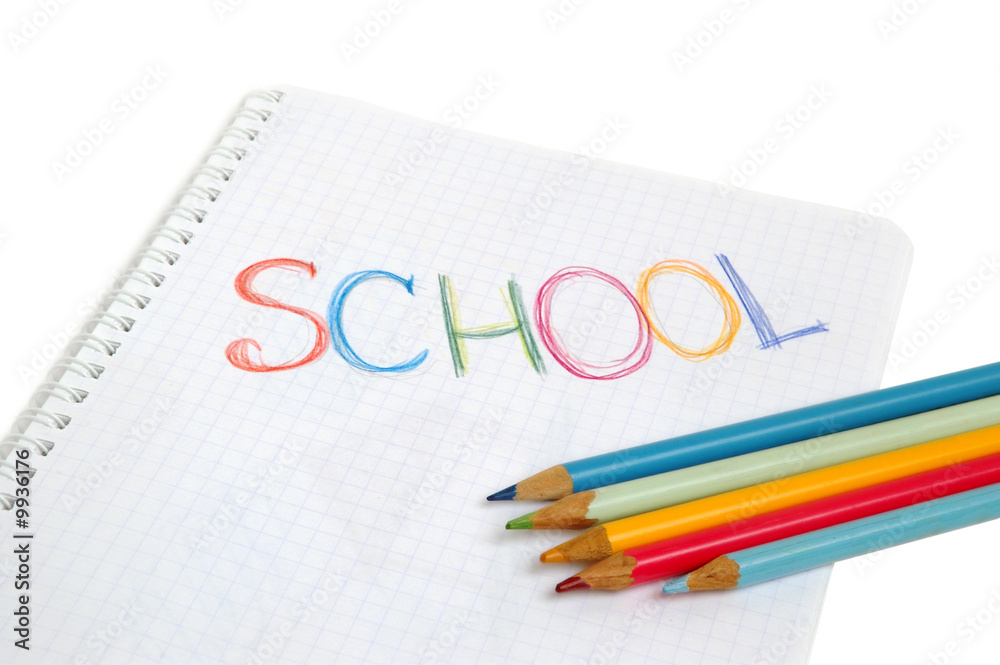 Child's drawing School in writing-book with color pencilse. Child's drawing School in writing-book with color pencilse.