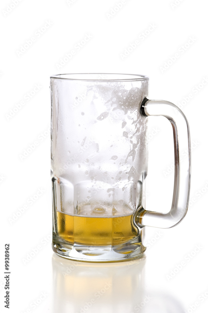A large glass beer mug on a white background
