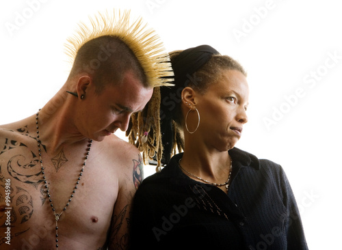 Man with Mohawk and Woman wearing Dreadlocks photo