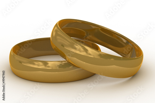 Two gold wedding rings. the...