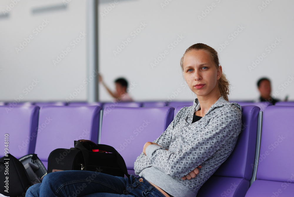 Woman at the airport, shallow DOF Woman at the airport, shallow DOF