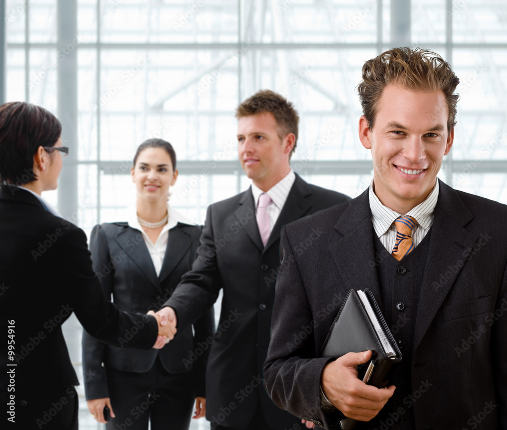 Team of business people, businessman in front, Team of business people, businessman in front,