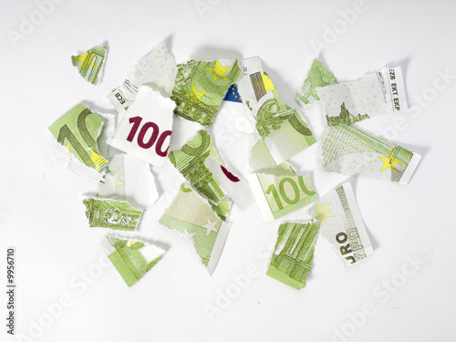 Ripped euro banknote on white background.