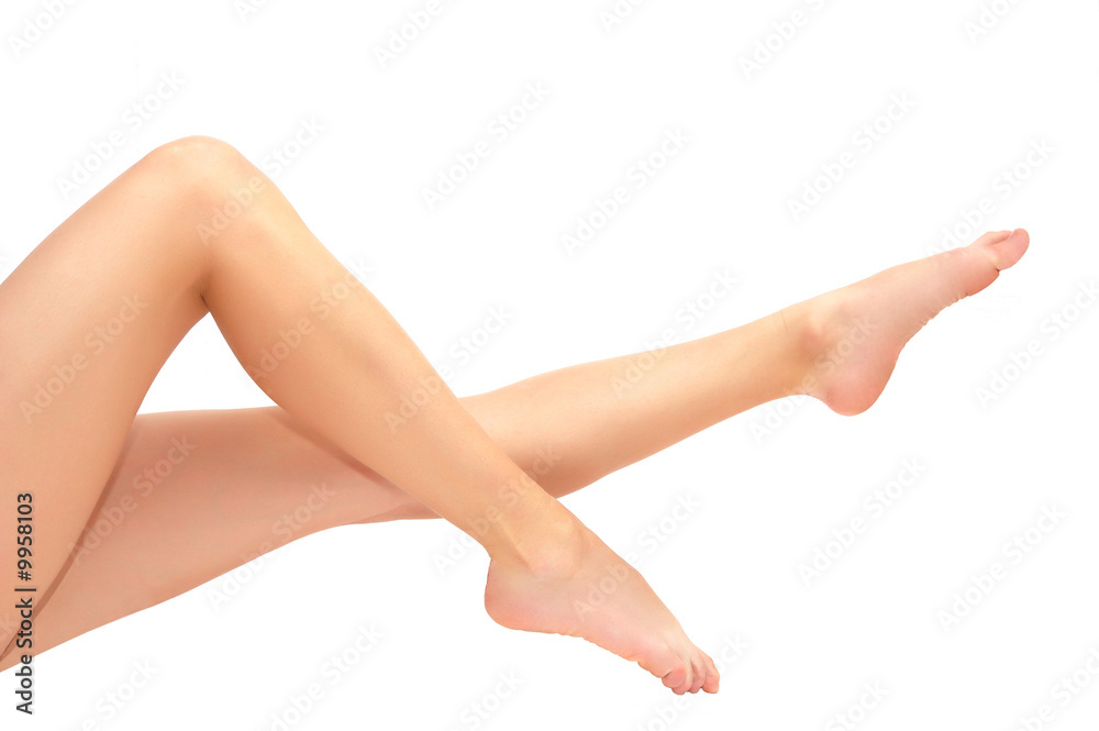 Beautiful smooth long woman legs isolated on white Beautiful smooth long woman legs isolated on white
