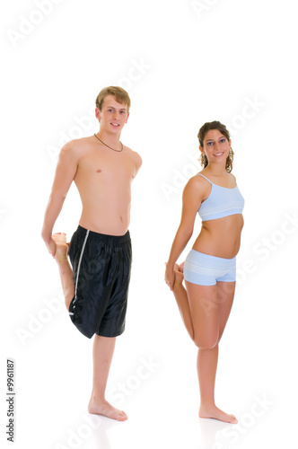 Young couple, female,  male doing fitness exercises