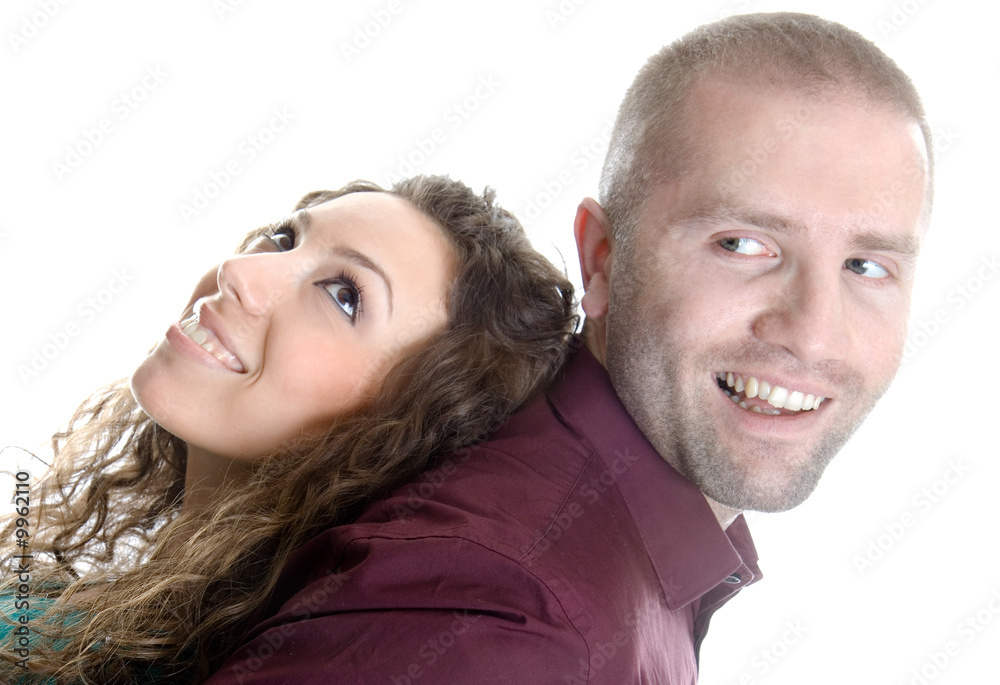 young man and beautiful young girl glance against each other. young man and beautiful young girl glance against each other.