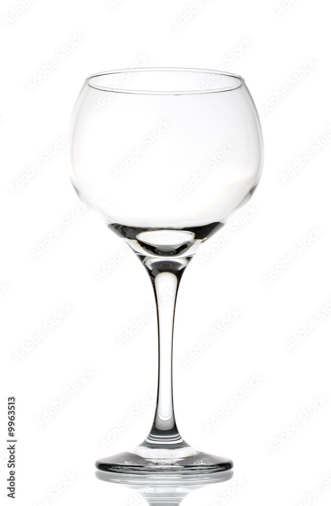 Large clear empty wineglass isolated against white Large clear empty wineglass isolated against white