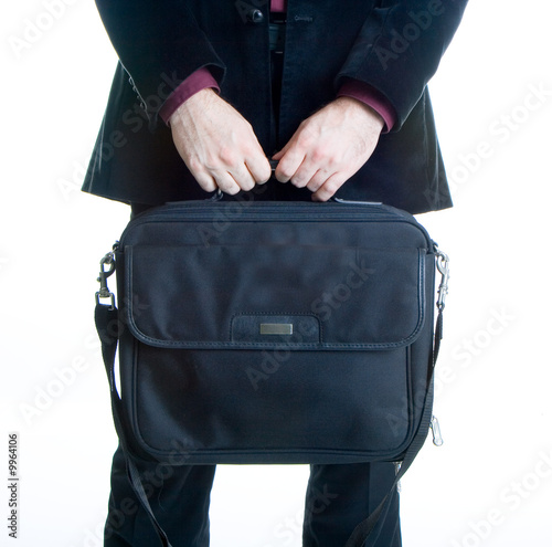 Man holding computer suitcase..