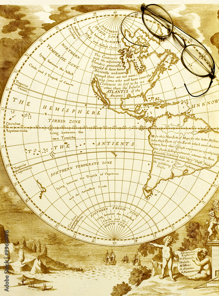 antique map of the western hemisphere with old spectacles