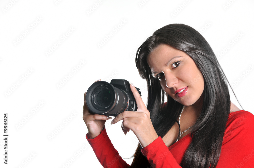 Young woman holding camera in hand taking picture isolated Young woman holding camera in hand taking picture isolated