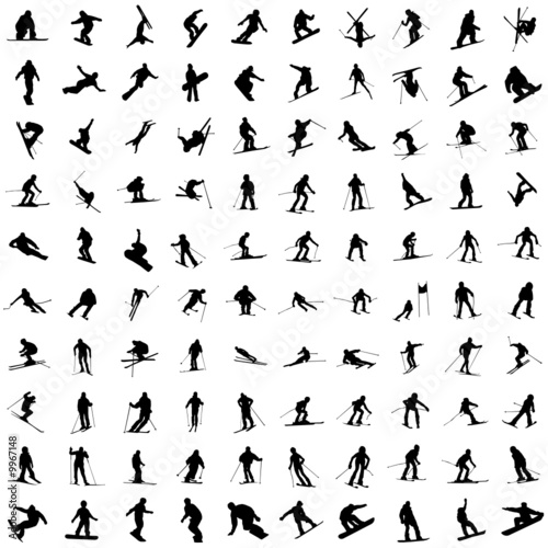 One hundred silhouette of skiers. photo