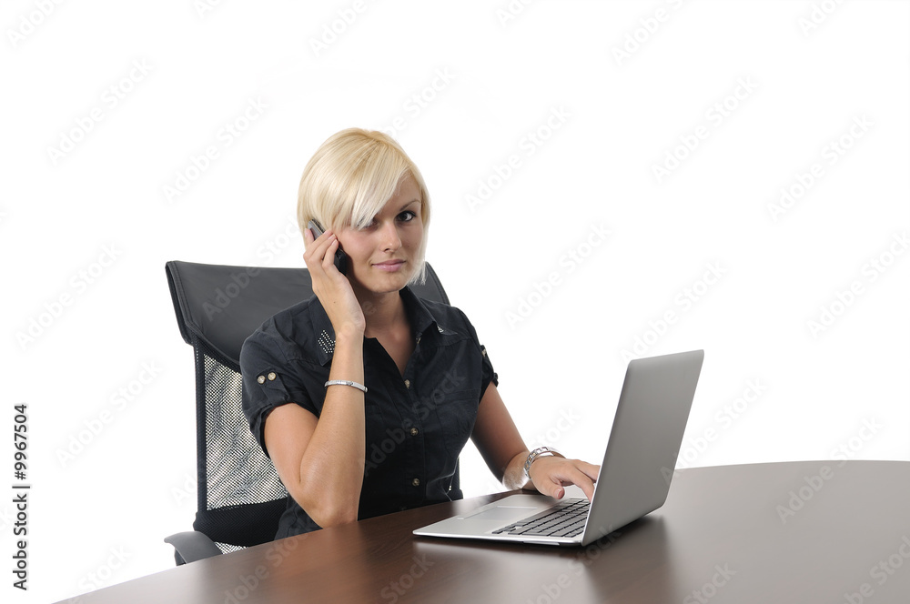One young business woman working in office on laptop One young business woman working in office on laptop