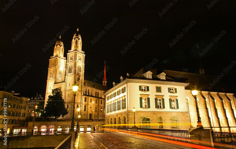 Fototapeta premium The Grossmunster Cathedral in Zurich Switzerland at night