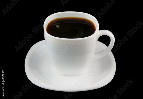 White cup of coffee isolated on black