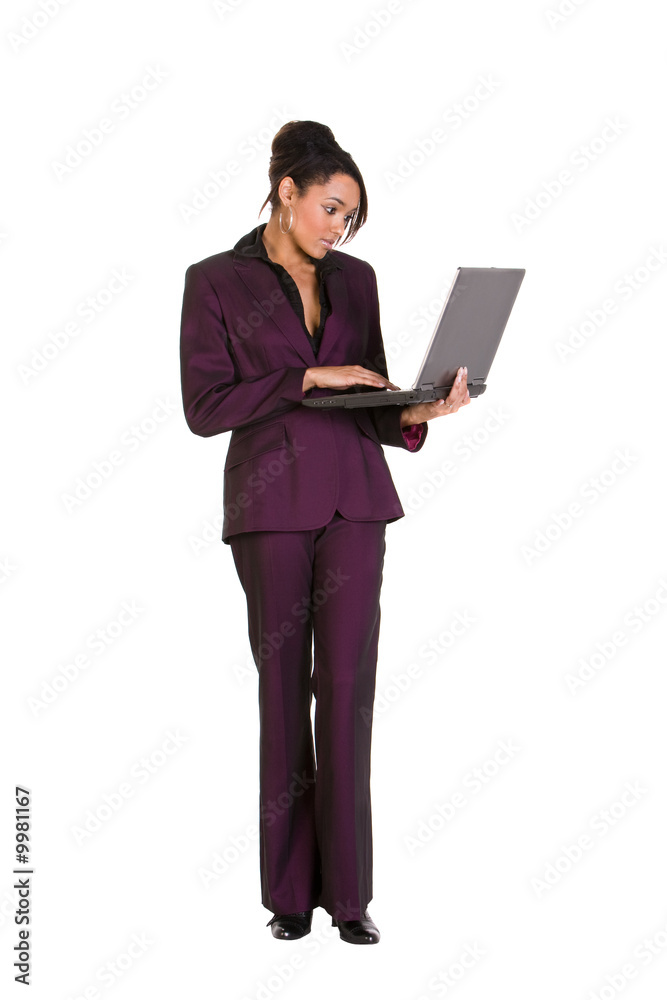 Young confident businesswoman using a laptop computer Young confident businesswoman using a laptop computer