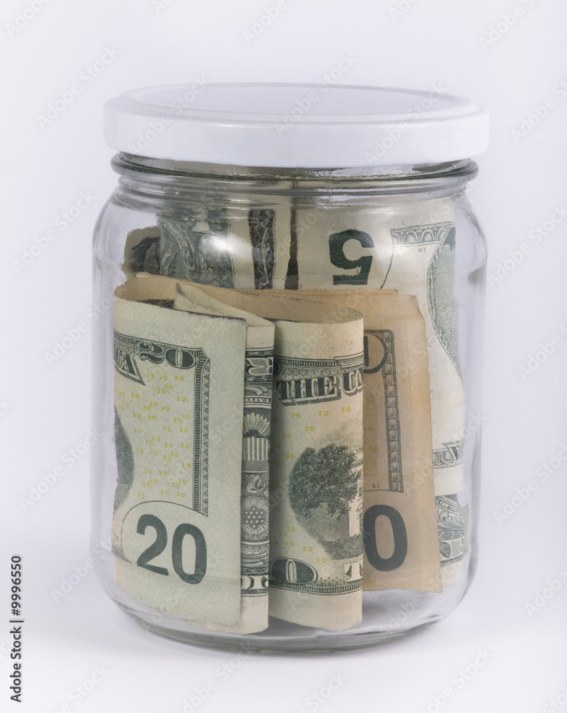 money in a glass jar money in a glass jar