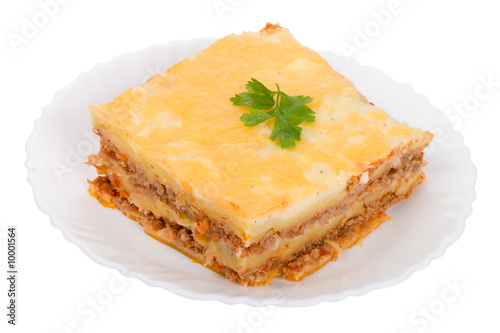 lasagne on plate, isolated on white