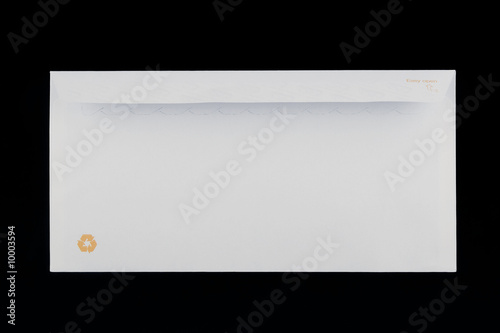 back of a white envelope isolated on black background